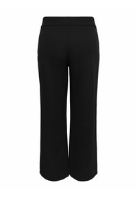 Schwarze, weit geschnittene Hose mit einer glatten Textur und einem elastischen Bund. Keine sichtbaren Taschen oder Beschläge, minimalistisches Design.