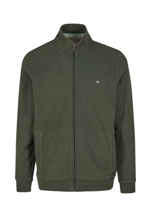 Felpa con zip di colore verde scuro realizzata in tessuto morbido, dotata di un alto colletto, un piccolo logo e tasche laterali. Texture liscia con polsini a costine.