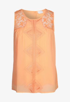 Peach sleeveless top with lace shoulders, decorative embroidery, and pierced diamond patterns along the front, smooth fabric, and a keyhole back.