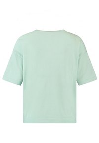 Maglietta a maniche corte verde menta realizzata in tessuto morbido, caratterizzata da una vestibilità rilassata e un semplice scollo rotondo. Nessun motivo o accento visibile.