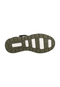 Sportlichem Schuhsohle mit einem gemusterten Gummidesign in Grün und Weiß, das Traktion und Langlebigkeit bietet.