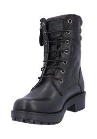 Bota de cuero negro con cordones y suela plana resistente, superficie texturizada, ojales de metal y cuello acolchado para mayor comodidad. Incluye una cremallera lateral.