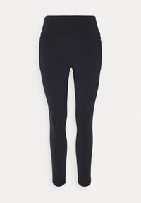 Leggings de color navy con una textura suave y una cinturilla alta, que cuentan con dos bolsillos laterales con cremalleras y un diseño ajustado y cónico.