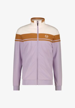 Chaqueta de chándal lila con un cuello alto, rayas horizontales blancas y marrones, y cierre de cremallera. Tejido suave con un diseño deportivo.