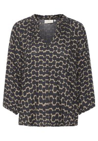 Blouse à motifs bleu marine et beige avec un col en V, des manches 3/4, et un détail froncé au niveau du col, confectionnée dans un tissu léger.