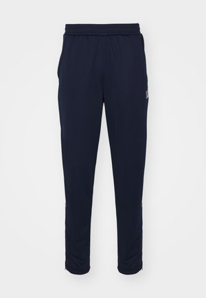 Pantalons de sport bleus marine avec une taille élastique, des poches latérales et des ourlets zippés. Fabriqués en tissu lisse et extensible.