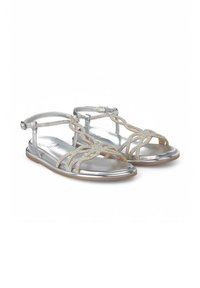 Metalen zilveren sandalen met sprankelende accenten, open teen ontwerp en enkelband. Kenmerkt kruisbanden en een platte rubberen zool.