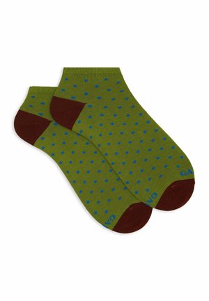Calzini verdi con pois blu, dettagli marroni al tallone e alla punta, realizzati in materiale morbido a maglia, con una forma arrotondata.