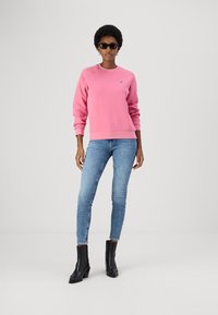 Lacoste Sportska majica - reseda pink
