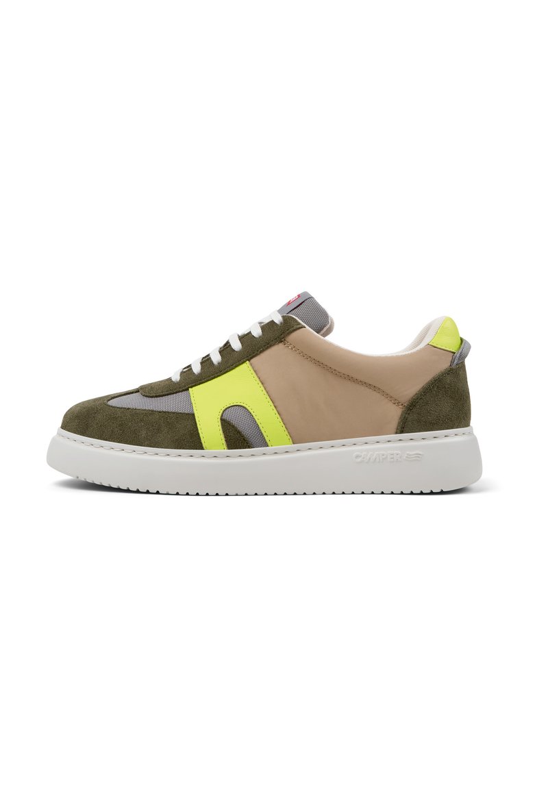 Sneaker with a combination of green suede and beige synthetic materials, featuring gray accents, a bright yellow stripe, and a white sole.