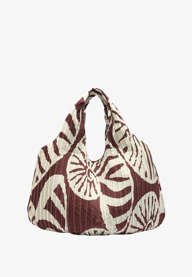 Miękka torba na ramię z plisowanego materiału w brązowe i białe abstrakcyjne okrągłe wzory oraz pojedynczym wiszącym uchwytem.