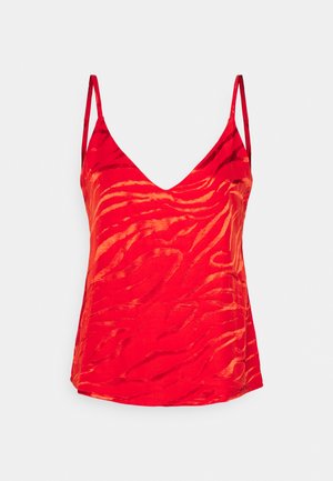 Top vermelho sem mangas com um decote em V profundo, apresentando um padrão texturizado de riscas de zebra em tons de vermelho escuro e laranja. Acabamento de tecido suave.