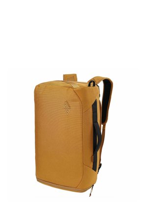 Sac à dos rectangulaire jaune moutarde avec des bretelles rembourrées, une poignée latérale et un logo Nitro embossé sur le devant, montré sous un léger angle.