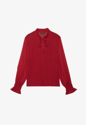 Punane pikkade varrukatega pluus kergest kangast, millel on kõrge kaelus sidumise detailiga ja lopsakad mansetid. Sile tekstuur, lõdva lõikega.