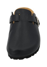 Black leather clog featuring a textured finish, adjustable buckle strap, and a cushioned tan insole. Rounded toe and rubber outsole.