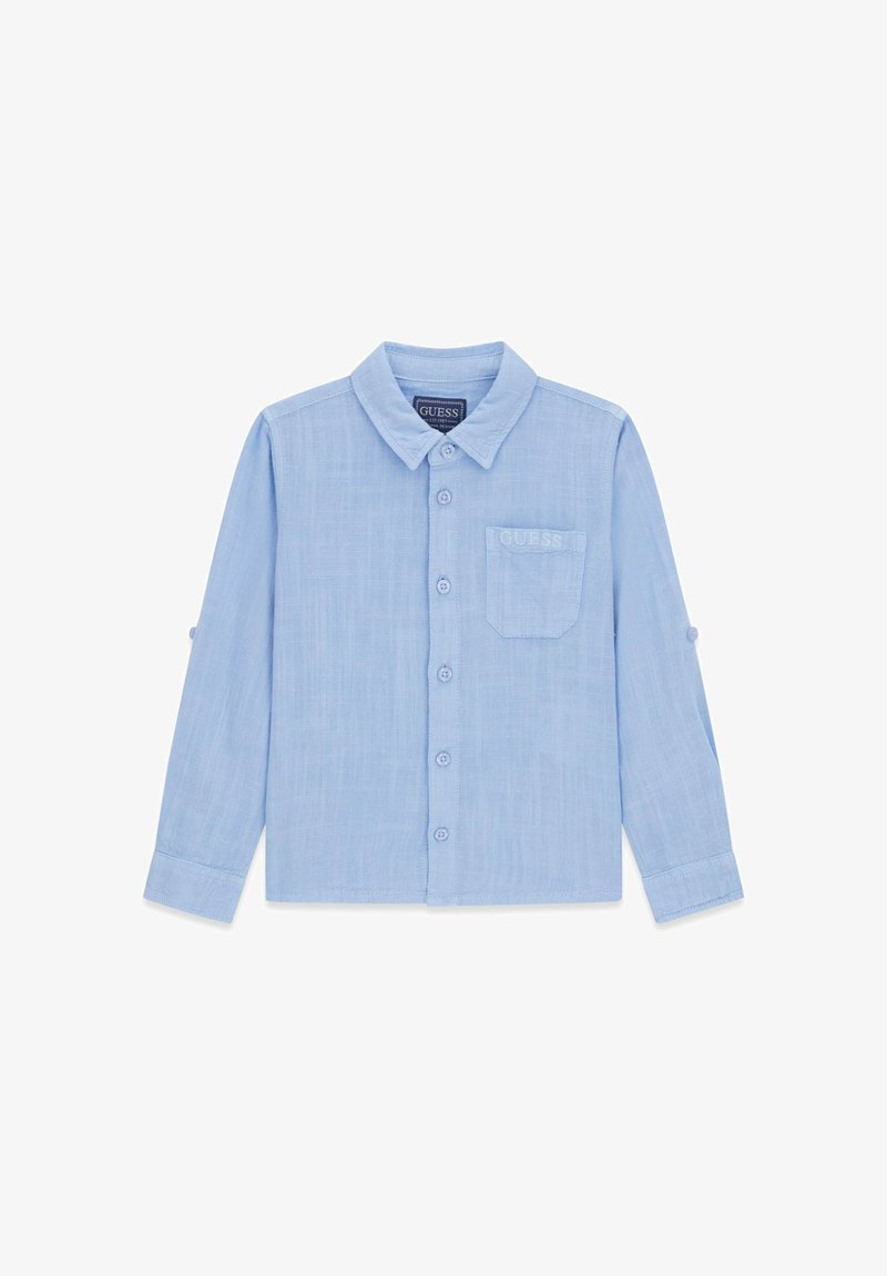 Chemise bleu clair à manches longues, boutonnée, avec col et poche poitrine brodée du logo "GUESS".
