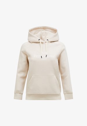 Beige hoodie met voorzak, capuchon met trekkoord, geribde manchetten en tekst "Peak Performance Est. 1986" op de borst.
