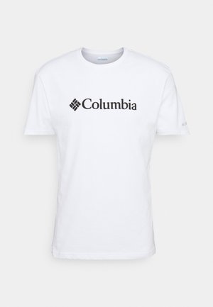 T-shirt blanc à manches courtes et col rond avec logo et emblème "Columbia" en noir centrés sur la poitrine, présenté sur un fond uni.