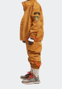 adidas Originals IVY PARK CANVAS JACKET - Mezisezónní bunda  - focus orange