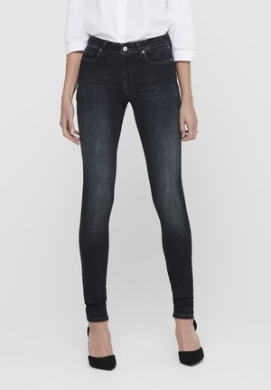 Jeans skinny de mezclilla en un tono oscuro con una textura suave, que presentan una cinturilla alta, bolsillos delanteros y un diseño clásico de cinco bolsillos.