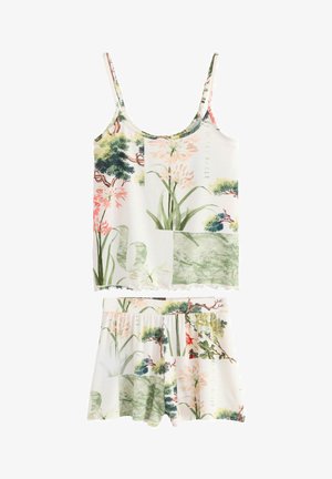 Ensemble de pyjama floral sans manches comprenant un débardeur et un short. Fabriqué en tissu doux avec un imprimé botanique mélangé dans des couleurs pastel.