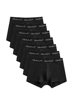 Sześć czarnych bokser GANT z gumą z logo w pasie, ułożonych wachlarzowo na białym tle.