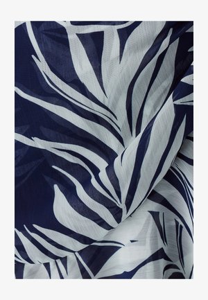 Navy and white fabric featuring a botanical leaf pattern; lightweight, sheer texture with flowing lines and contrasting colors.