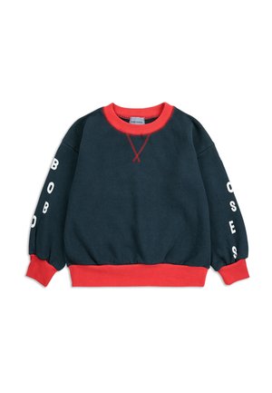 Dunkelblaues Sweatshirt mit einem roten gerippten Kragen und Bündchen. Verfügt über weiße Schriftzüge auf den Ärmeln. Hergestellt aus weichem, strukturiertem Stoff.