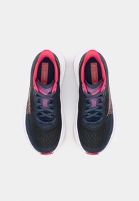Running shoes with a dark navy upper, pink accents, breathable mesh, a cushioned sole, logo detail, and textured pattern.
