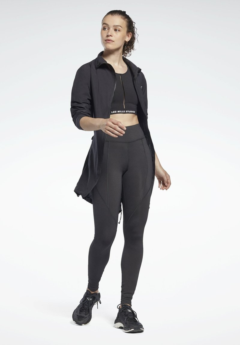 Damen Sportbekleidung | Reebok LES MILLS LUX PERFORM Top black/schwarz - LV53322 Damen Sportbekleidung | Reebok LES MILLS LUX PERFORM Top black/schwarz - LV53322