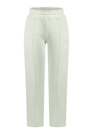 Pantaloni sportivi verde chiaro con vita elastica, caratterizzati da dettagli di cucitura verticale e un piccolo logo sulla parte laterale.