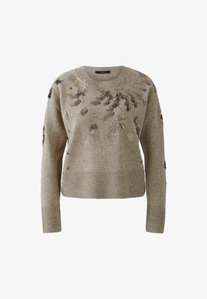 Pull beige avec un ourlet et des poignets côtelés, orné d'une broderie florale en perles complexe dans des tons sombres et métalliques sur le devant.