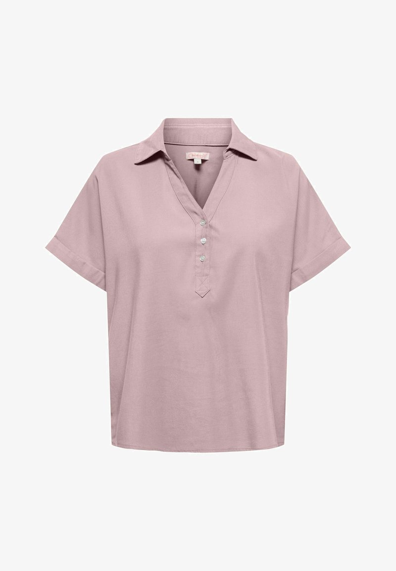 Polo manches courtes rose pastel avec trois boutons et un col classique sur fond blanc.