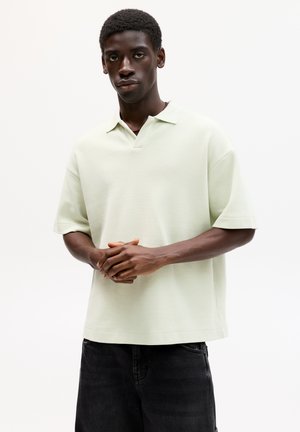 BOXY FIT - Polo shirt - green