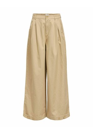 Bézs széles szárú nadrág pliszékkel, magas derékkal, gombos és cipzáras záródással, övbújtatókkal, oldalzsebekkel és gombos mandzsettákkal a szárvégeknél.