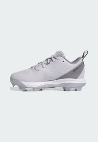 Zapatillas deportivas grises con un upper texturizado, diseño ligero, entresuela blanca y clavos prominentes en la suela para tracción.