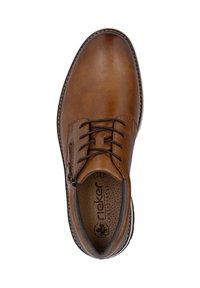 Chaussure en cuir brun à lacets avec fermeture Éclair sur le côté, semelle intérieure rembourrée visible avec le logo "rieker antistress" et surpiqûres contrastantes autour de la semelle.