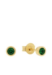 Pendientes de botón color oro con piedras preciosas verdes redondas de diseño facetado. Incluyen un pasador con un respaldo seguro.
