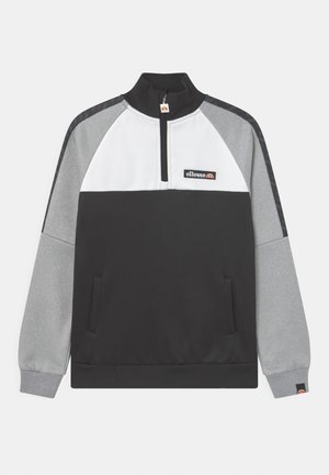 Sweat-shirt noir, blanc et gris à fermeture éclair courte, avec poches latérales, poignets côtelés, et logo ellesse sur la poitrine et le poignet.