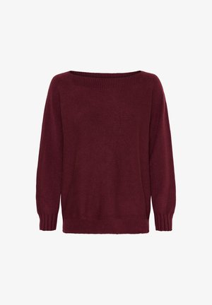 Burgundy striktrøje med bred bådudskæring, ribbede manchetter og afslappet pasform. Blød tekstur og jævnt fordelt glatte masker.