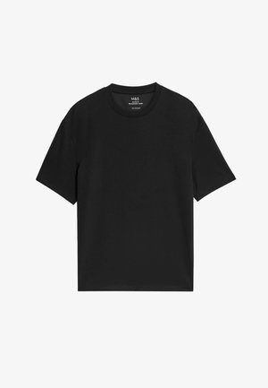 T-shirt en coton noir à manches courtes, col rond et coupe décontractée. Texture lisse sans motifs ni accents visibles.