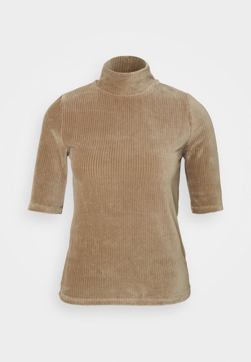 Haut à col roulé en velours côtelé beige, manches courtes, coupe slim et ourlet droit, sur fond blanc.