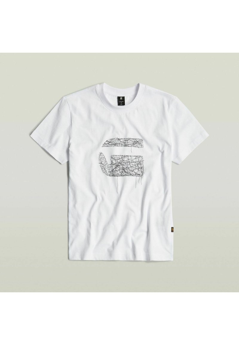 Camiseta blanca de algodón con un diseño abstracto negro en el frente. Mangas cortas, cuello redondo, textura suave y un ajuste casual.