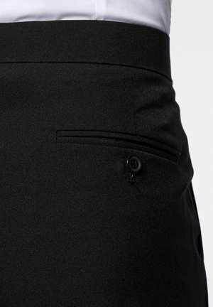 Black trousers with a smooth texture, featuring a side pocket with a black button and a tailored waistband.