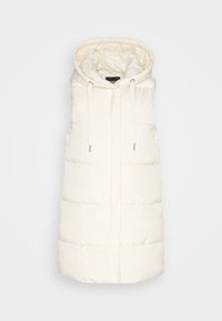Lightweight, cream padded vest with a hood, featuring a full-length front zip, drawstring ties, and a boxy silhouette. Smooth texture, no patterns.
