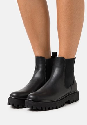 Enkellaarsjes met plateauzool - black