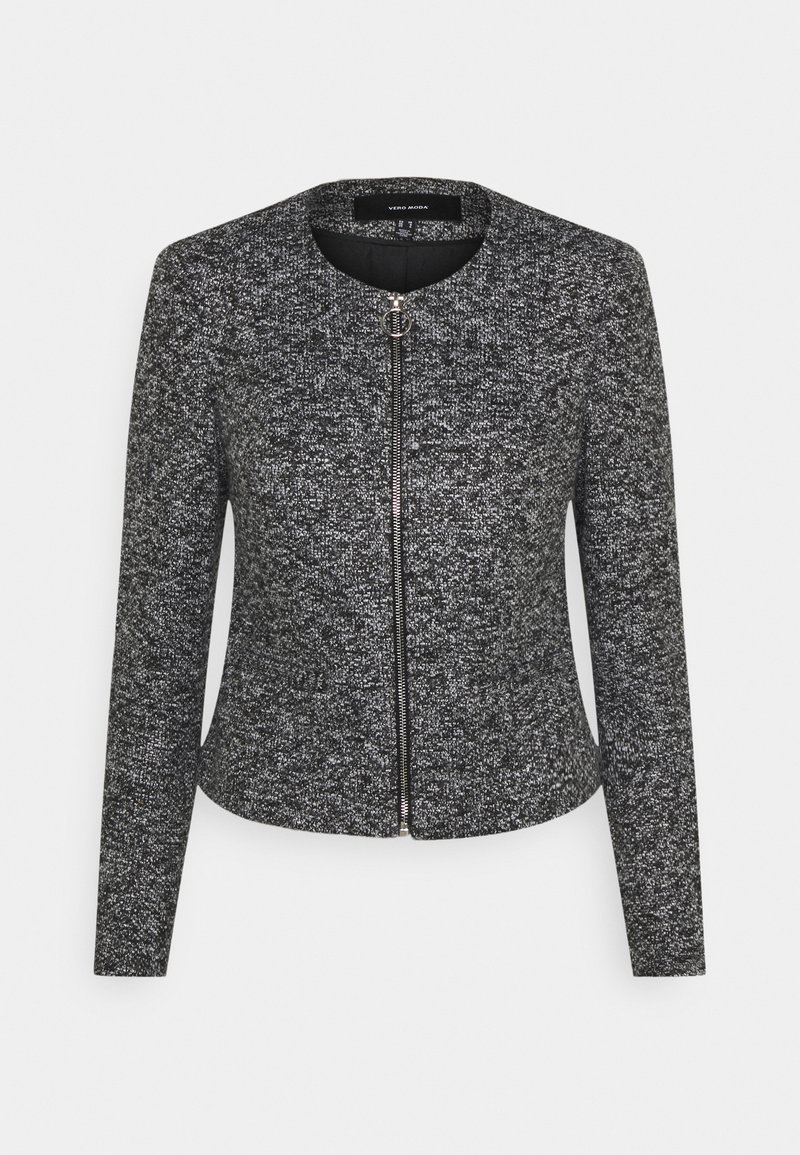 Veste femme texturée gris foncé et noir avec manches longues et fermeture éclair devant avec tirette ronde.