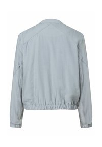 Light blue bomber jacket with a gathered hem and sleeves, featuring a smooth texture and a minimalistic design. Back view shown.
