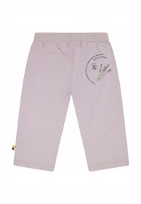 Helle lavendelfarbene Baumwollhose mit einem elastischen Bund, versehen mit einem kreisförmigen grafischen Motiv eines Bienen und Lavendel. Enthält ein kleines, buntes Etikett am Saum.