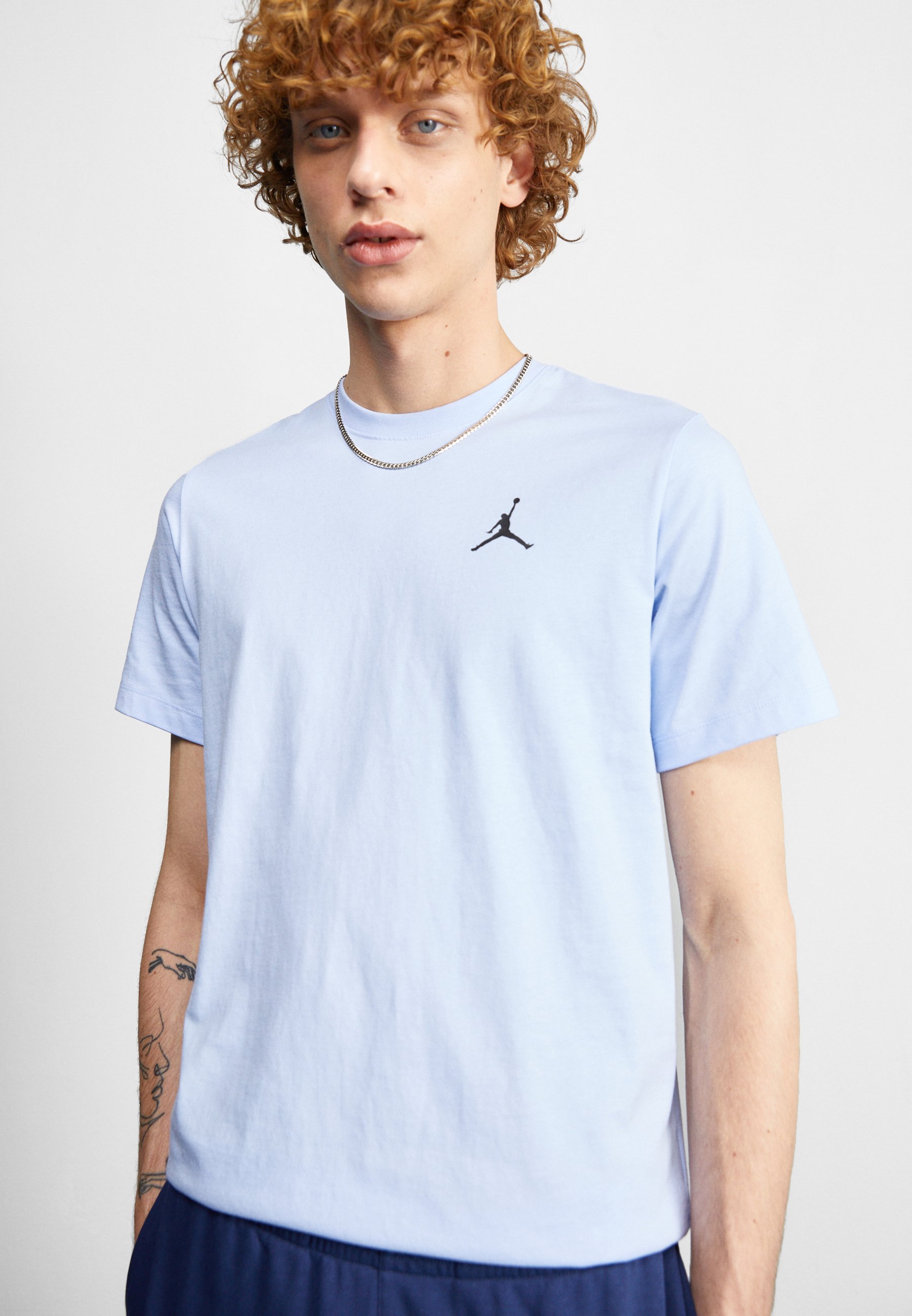 black and blue jordan shirts